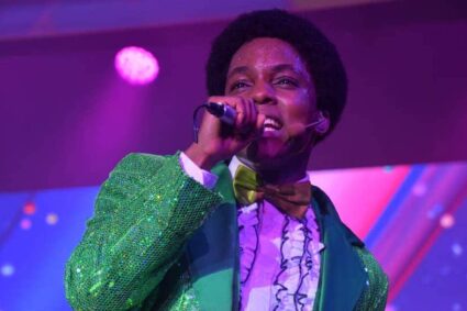 Not a lounge singer-backstage with a carnival playlist performer